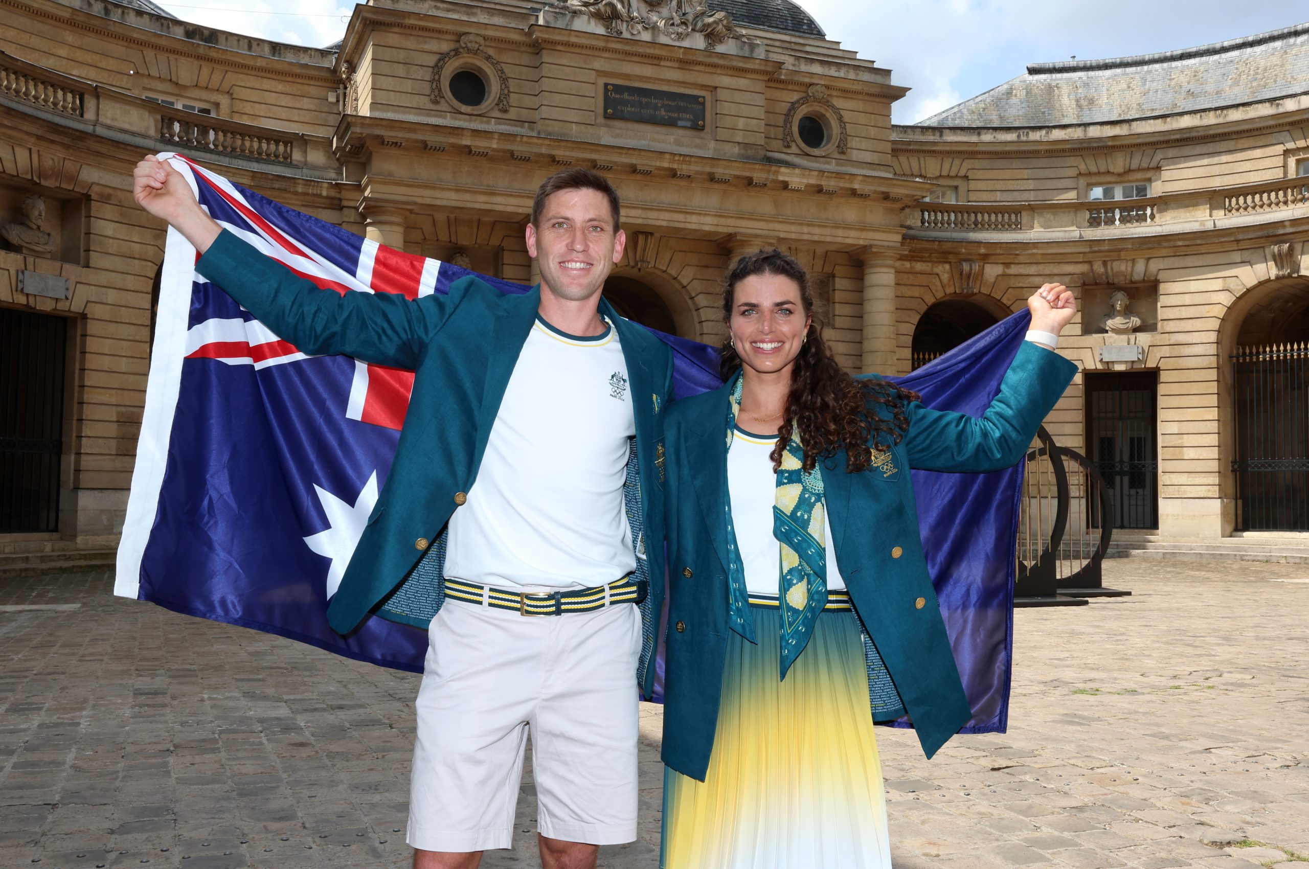 PARIS, FRANCE - JULY 24: (L-R) Eddie Ockenden and Jessica Fox of Team Australia pose with a flag after being named flagbearers ahead of the Paris 2024 Olympic Games on July 24, 2024 in Paris, France. (Photo by Richard Pelham/Getty Images)