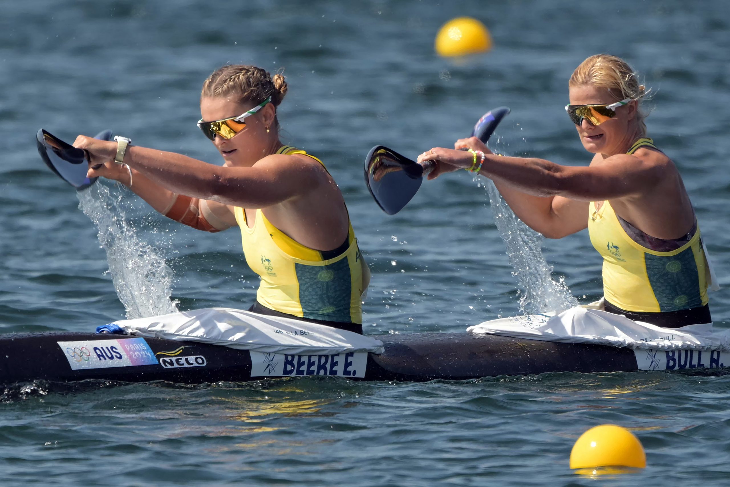 Australia's Ella Beere (L) and Australia's Alyssa Bull compete in the women's kayak double 500m heats canoe sprint competition at Vaires-sur-Marne Nautical Stadium in Vaires-sur-Marne during the Paris 2024 Olympic Games on August 6, 2024. (Photo by Bertrand GUAY / AFP) (Photo by BERTRAND GUAY/AFP via Getty Images)