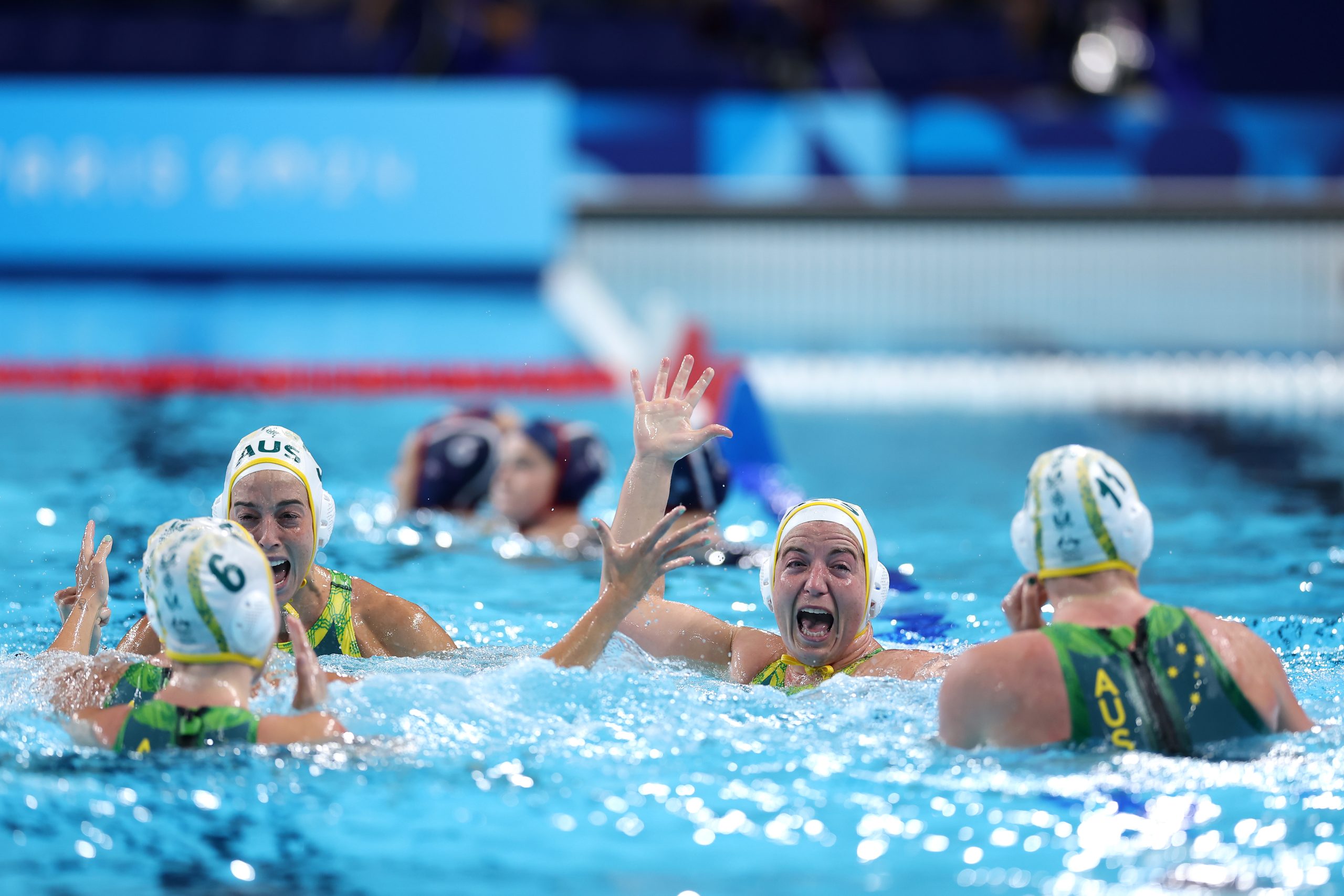 NANTERRE, FRANCE - AUGUST 08: Zoe Arancini of Team Australia celebrates victory with teammates following the penalty shoot out in the Women's Semifinal match between Team Australia and Team United States on day thirteen of the Olympic Games Paris 2024 at Paris La Defense Arena on August 08, 2024 in Nanterre, France. (Photo by Maddie Meyer/Getty Images)